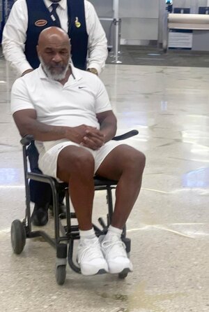 mike-tyson-back-pain-wheelchair-02.jpg