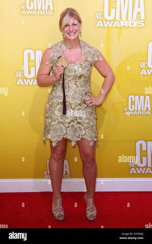 kayla-harrison-attending-the-press-room-at-the-46th-annual-country-music-awards-in-nashville-t...jpg