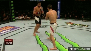 Adriano_Martins_levels_Islam_Makhachev_with_counter_hook.gif