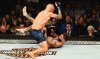 TJ-Dillashaw-punches-Cody-Garbrandt-1118938.jpg