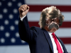 donald-trump-fist-raised-florida-rally-7-31-18-getty-640x480.png