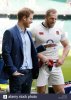 prince-harry-left-speaks-with-england-rugby-player-james-haskell-during-HP1WRF.jpg