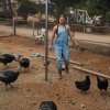 Ronda-Rousey-feeding-chickens-on-farm.jpg