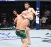 Islam head kicks Alex .jpg
